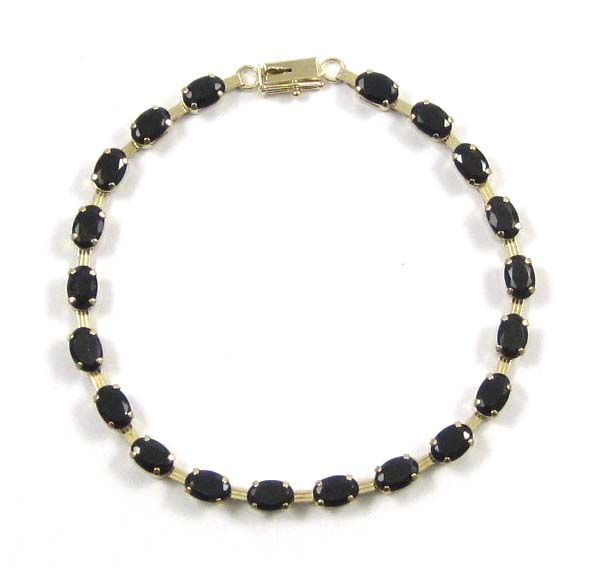 Appraisal: BLACK TOURMALINE AND TEN KARAT GOLD BRACELET - inches in