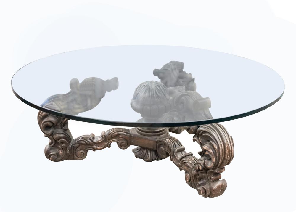 Appraisal: CARVED WALNUT GLASS COFFEE TABLEProvenance The Estate of David Karpeles