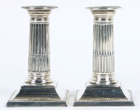 Appraisal: Pair of English sterling silver weighted candlesticks Sheffield England hallmarks