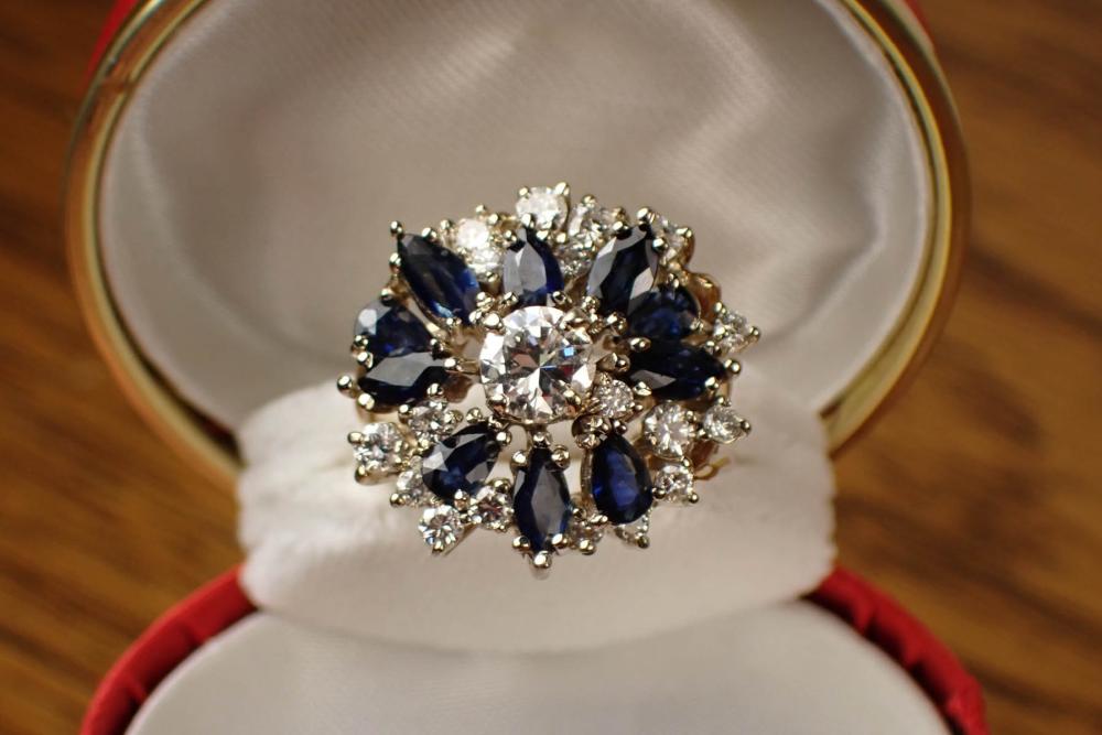 Appraisal: DIAMOND SAPPHIRE AND FOURTEEN KARAT GOLD RING The k yellow