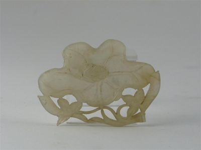 Appraisal: A small white jade dish formed as a lotus leaf