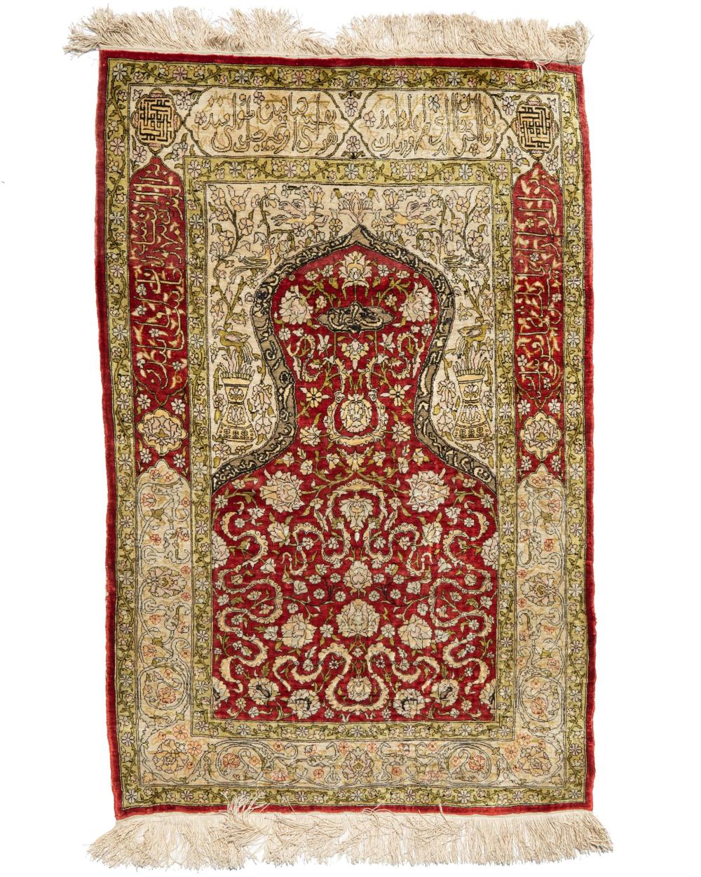 Appraisal: A Hereke prayer rug th Century Silk on silk foundation