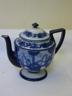 Appraisal: A DOULTON BURSLEM POTTERY TEAPOT of pedestal form in Morrisian