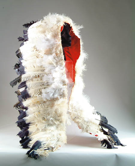 Appraisal: PLAINS INDIAN STYLE TH CENTURY DANCE CAPE Shoulder length feathered