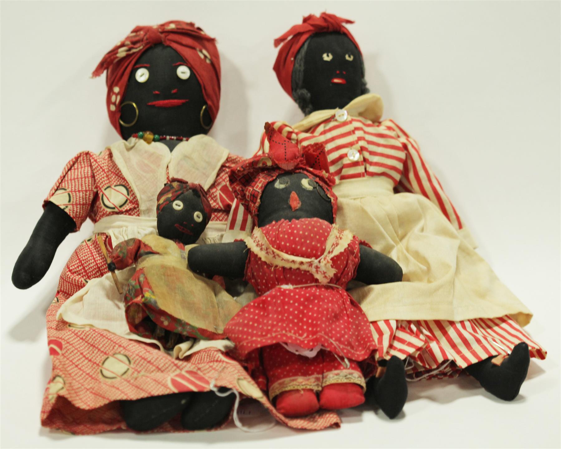 Appraisal: FOUR AUNT JEMIMA-STYLE CLOTH DOLLS American early th century Dolls