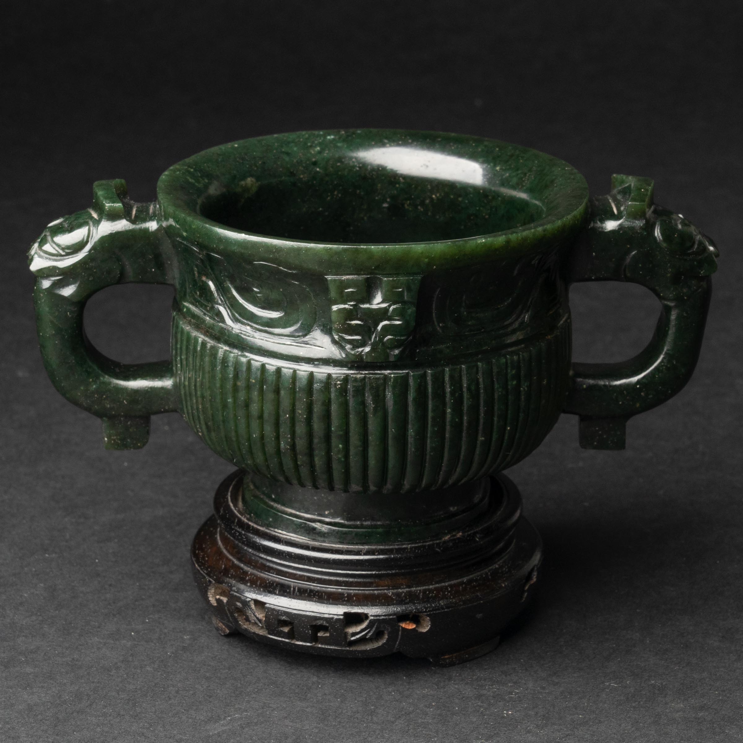 Appraisal: A Dark Green Archaistic Jade Gui-Form Censer Ming Qing Dynasty