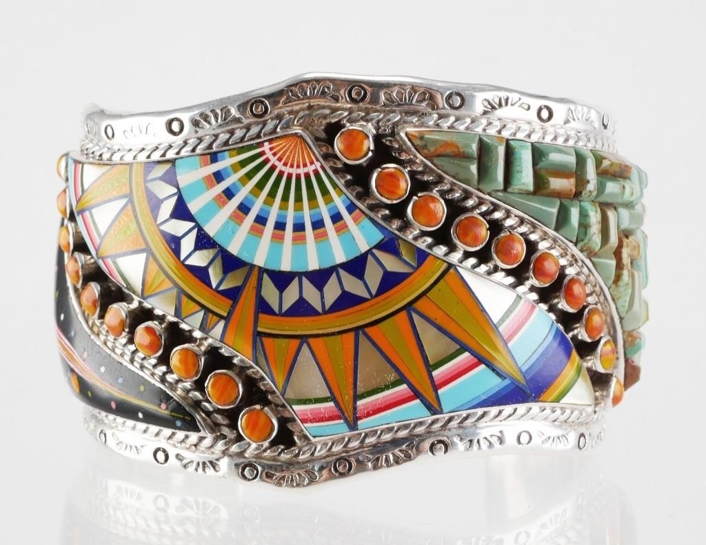 Appraisal: Sterling silver cuff bracelet featuring Native American style cosmic or