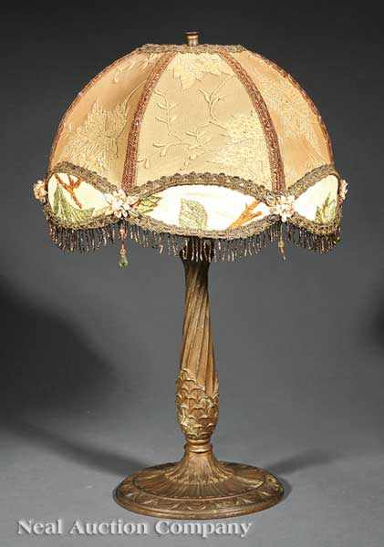 Appraisal: An American Bronze Table Lamp c twisted standard the silk