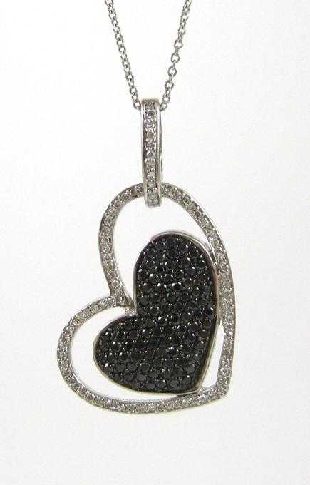 Appraisal: BLACK AND WHITE DIAMOND PENDANT NECKLACE suspended on an inch