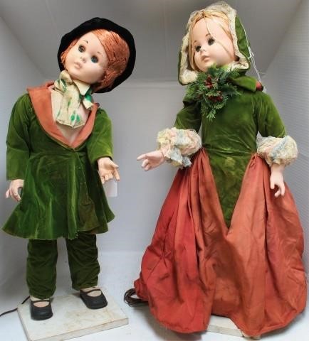 Appraisal: SIMILARLY DRESSED CHILD AUTOMATON CAROLERS DRESSED TO RESEMBLE MID-VICTORIANS BOY