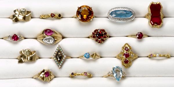 Appraisal: GOLD AND GEMSTONE RINGS Seventeen rings include diamonds rubies garnets