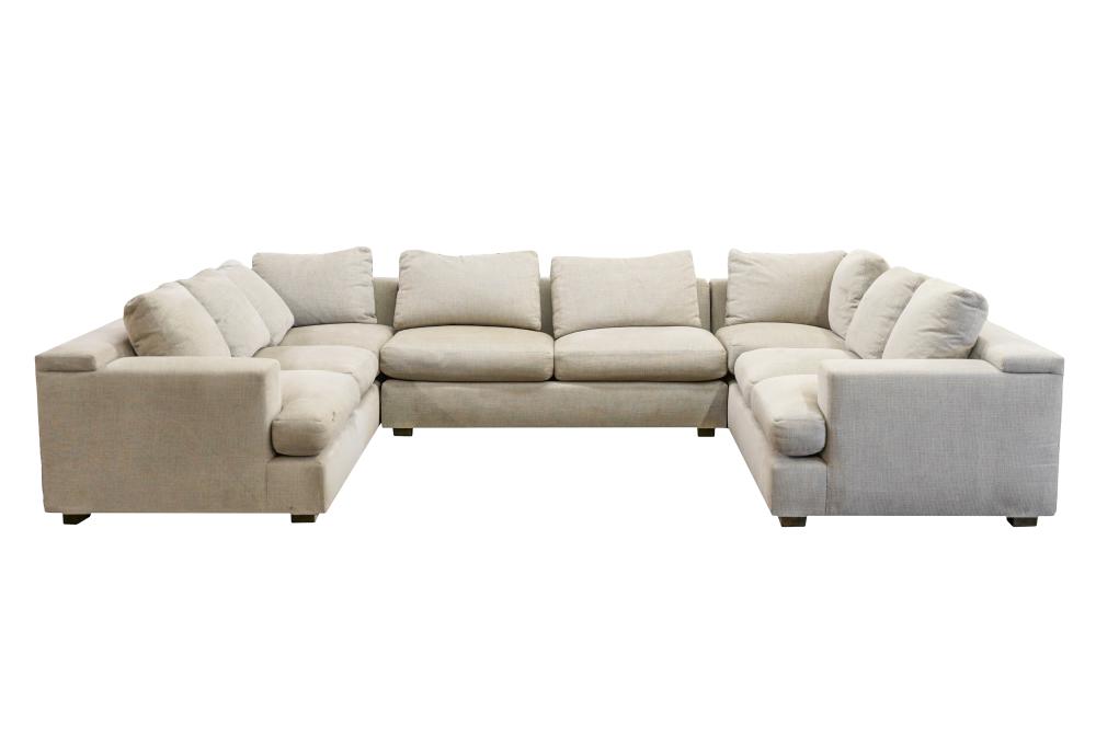 Appraisal: LORO PIANA GRAY FABRIC-UPHOLSTERED SECTIONAL SOFAthree parts each corner piece