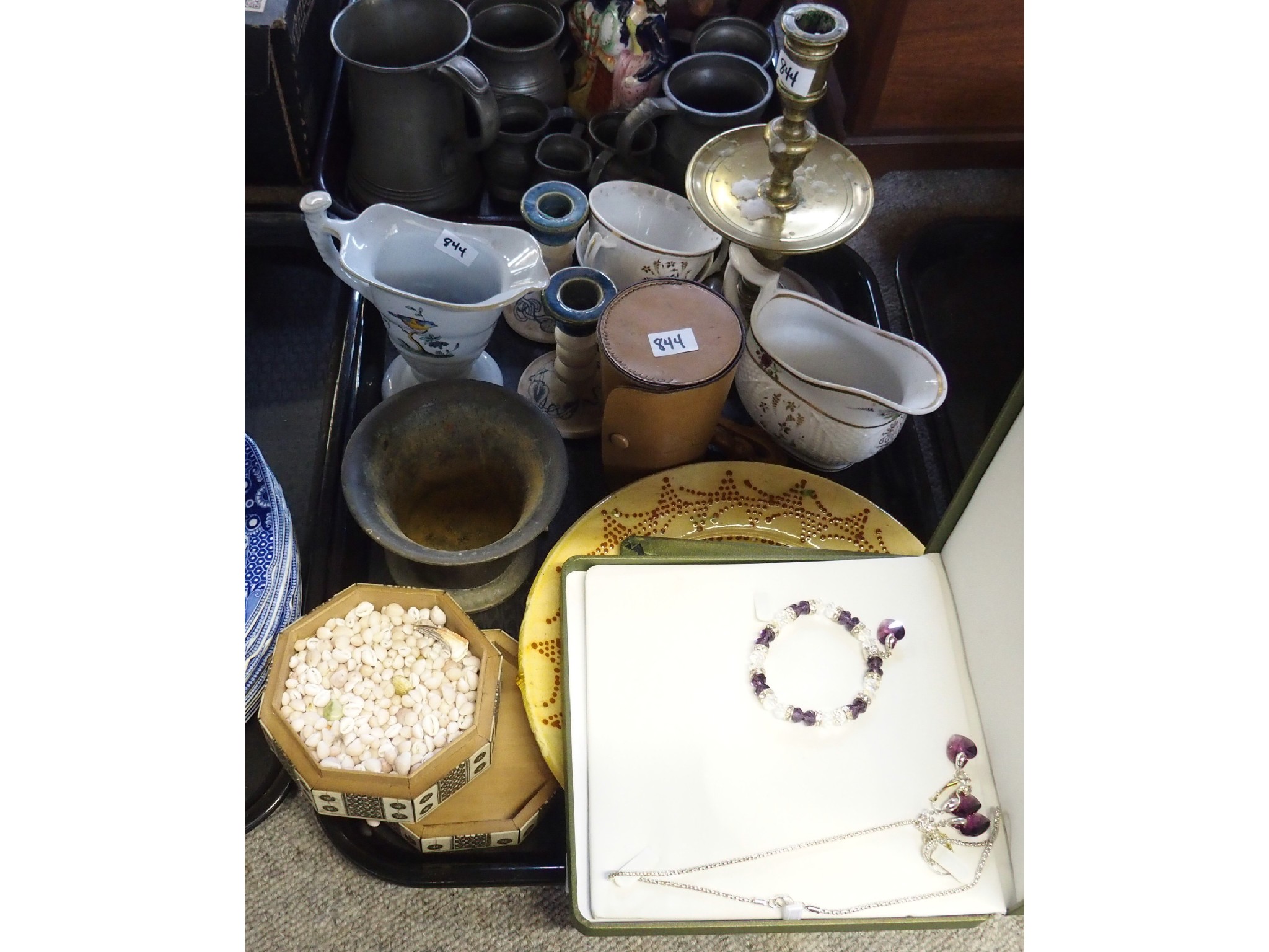 Appraisal: Tray comprising brass candlestick silvered metal nested cups in leather