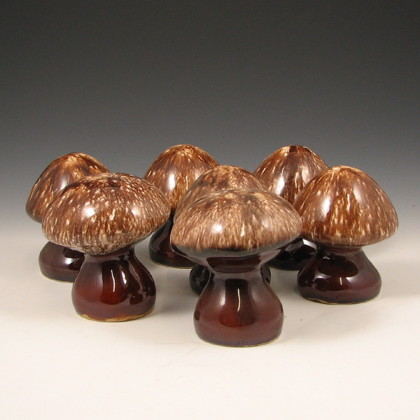 Appraisal: Hull Mirror Brown House Garden Mushroom Shakers Lot of seven