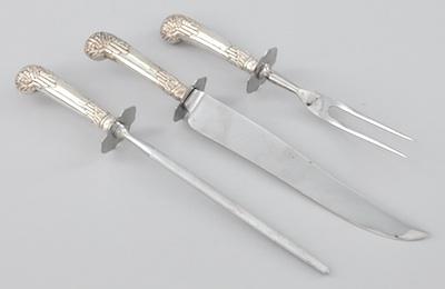 Appraisal: A Three Piece Carving Set with Sterling Silver Handles Consisting