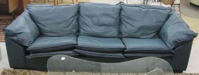 Appraisal: FOUR-PIECE CONTEMPORARY GREEN LEATHER SEATING FURNITURE SET comprising sofa loveseat