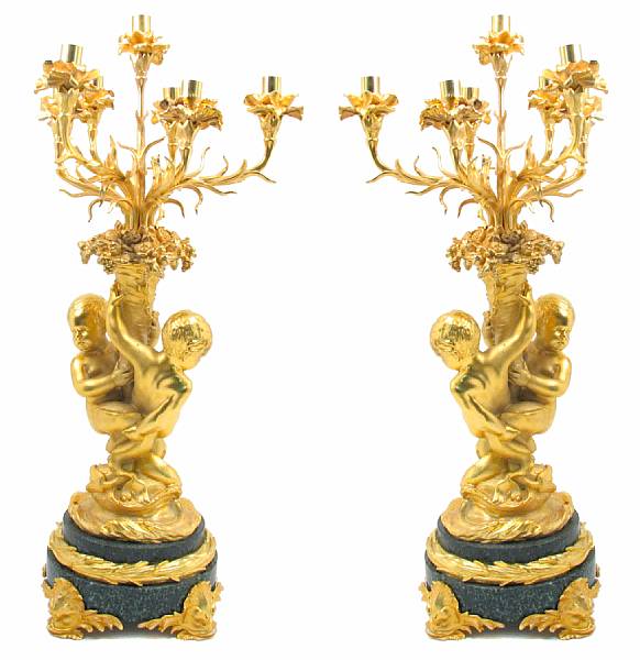 Appraisal: A pair of Louis XV style gilt bronze seven light