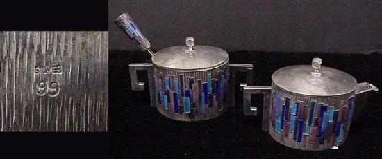 Appraisal: Mexican silver and enamel covered sugar and creamer along with