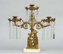 Appraisal: Single Gilt Bronze Candelabra Brightly gilt bronze figural of a