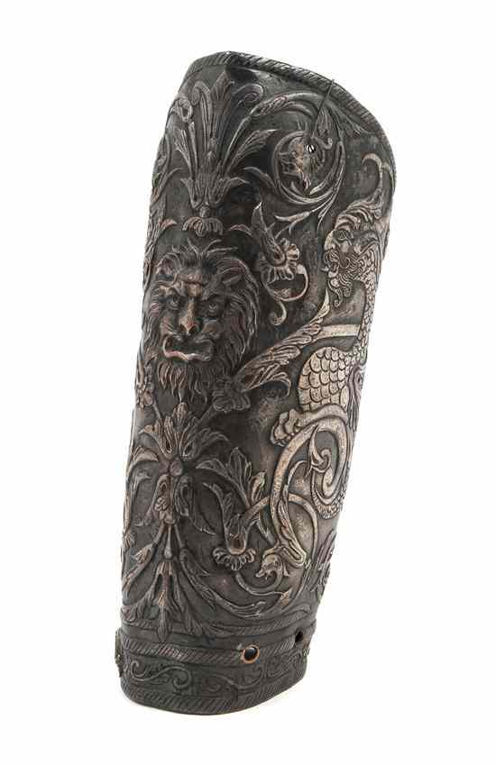 Appraisal: An Italian Armor Gauntlet with chased and repousse decoration of