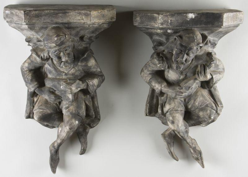 Appraisal: Pair of Jester Form Wall Brackets composition material with attractive