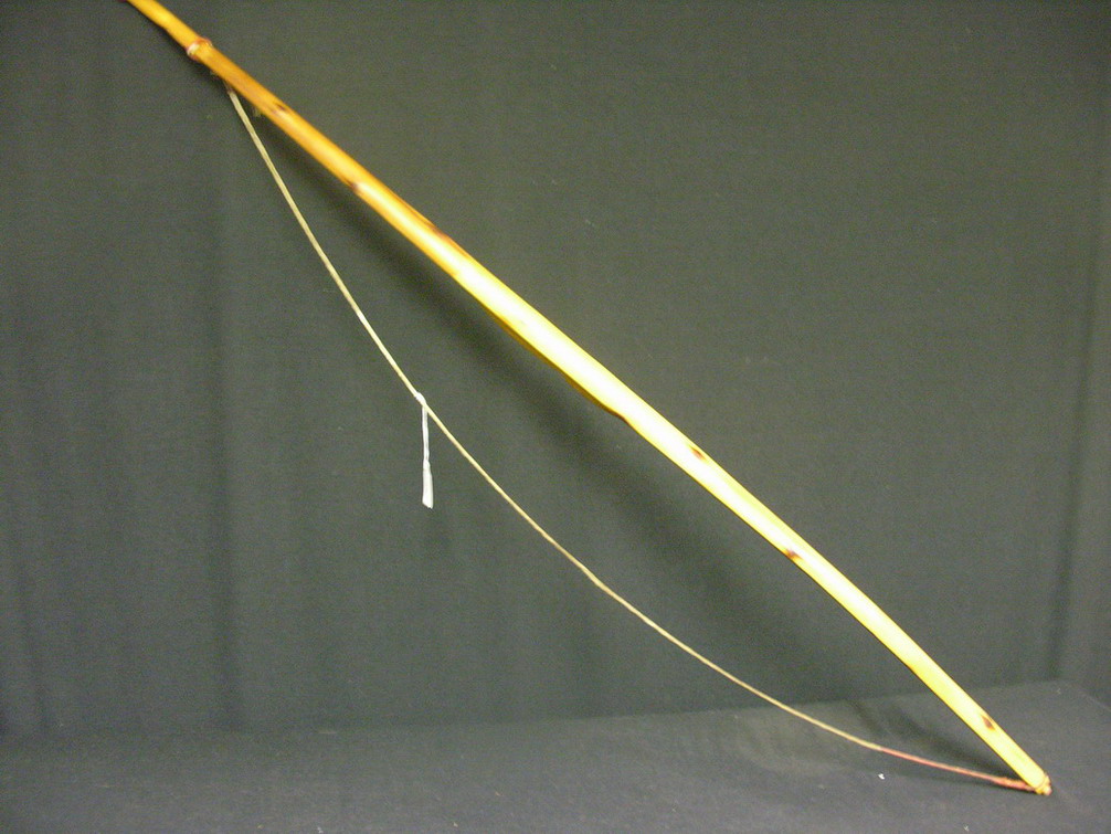 Appraisal: HAND CARVED WOODEN BOW By Harry Smith written in the