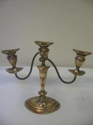 Appraisal: A PAIR OF EDWARDIAN CANDLEABRA of oval for in the