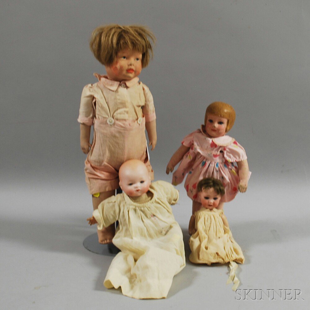 Appraisal: Four Dolls an Armand Marseille bisque-head baby doll with sleeping