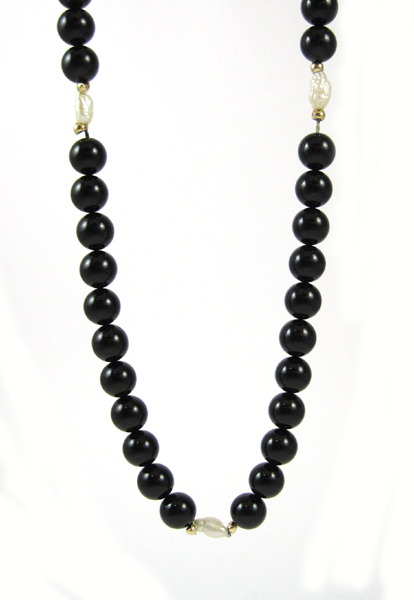 Appraisal: BLACK ONYX AND WHITE PEARL NECKLACE measuring - inches in