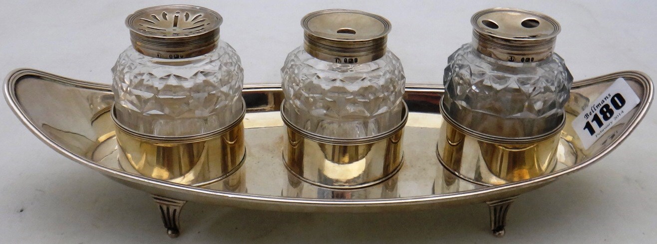 Appraisal: A George III silver inkstand of boat shaped form raised