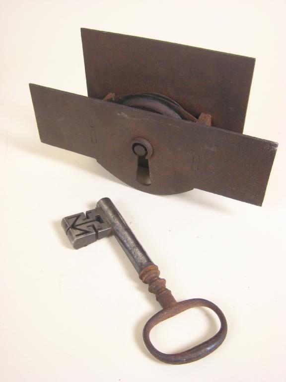 Appraisal: An iron Lock and Key with circular action and a