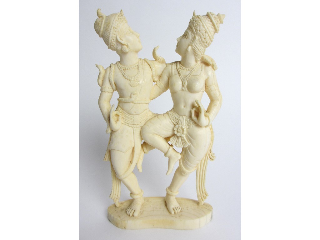 Appraisal: A Burmese carved ivory group of two dancers in an