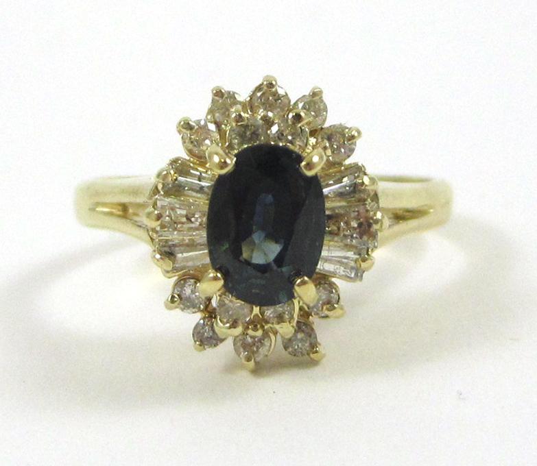 Appraisal: SAPPHIRE DIAMOND AND FOURTEEN KARAT GOLD RING with round-cut and