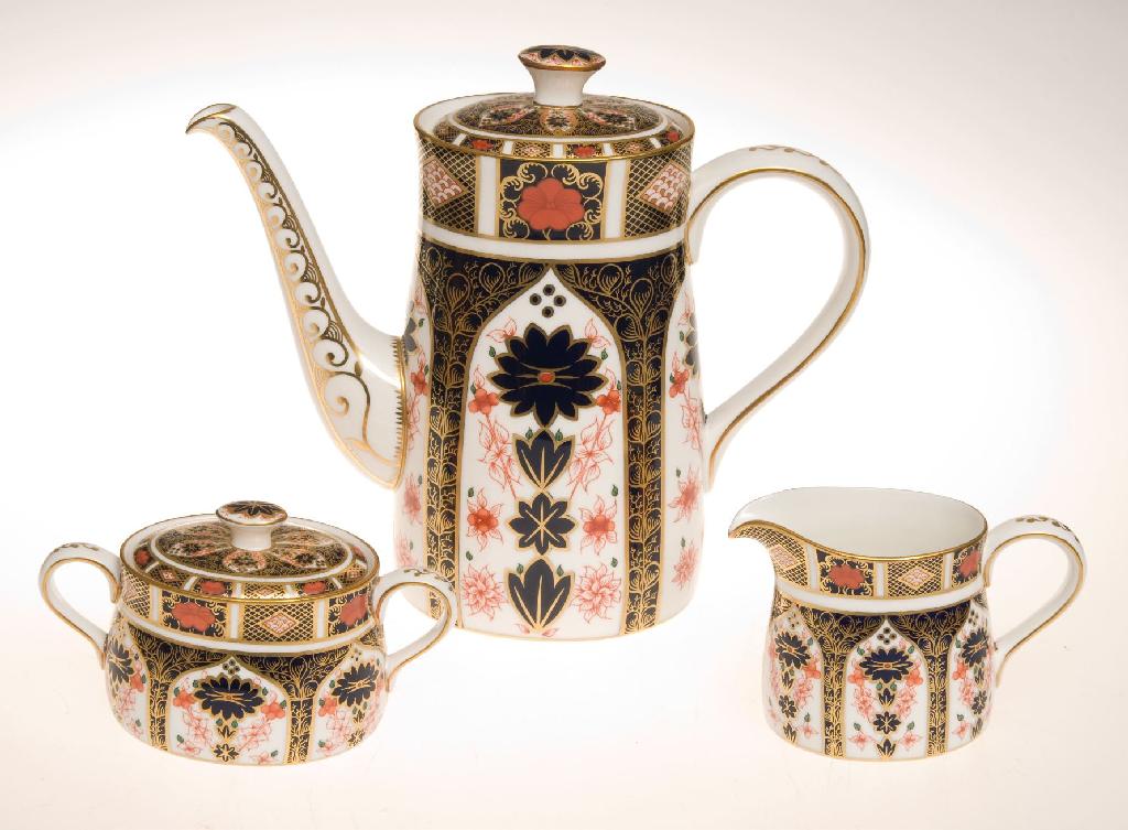 Appraisal: ROYAL CROWN DERBY THREE-PIECE COFFEE SERVICE comprising coffee pot cream