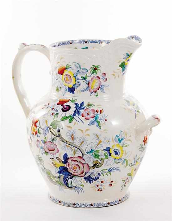 Appraisal: Oversized English transferware pitcher th century floral molded body fitted