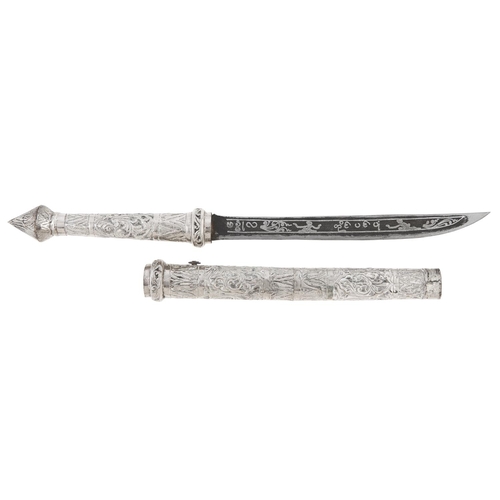 Appraisal: A South East Asian sheet silver hilted edged weapon and