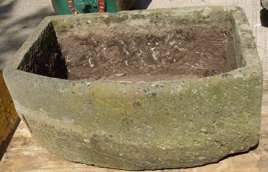 Appraisal: A D-shaped stone trough