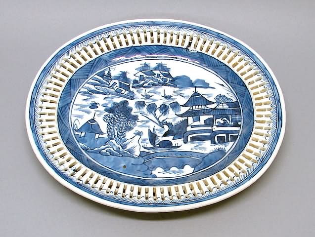 Appraisal: Blue and white landscape with water pagodas and bridge reticulated