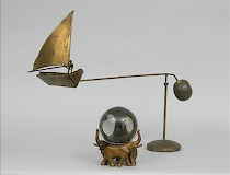 Appraisal: A Lot of Two Decorative Objects Lot includes a kinetic