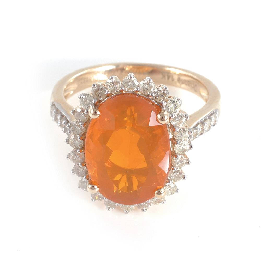 Appraisal: Fire opal and diamond ring ct oval opal accented by