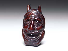 Appraisal: ANTIQUE WOOD MASK NETSUKE Well carved and antique wood Hannya