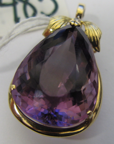 Appraisal: AMETHYST DIAMOND AND FOURTEEN KARAT GOLD PENDANT set with a