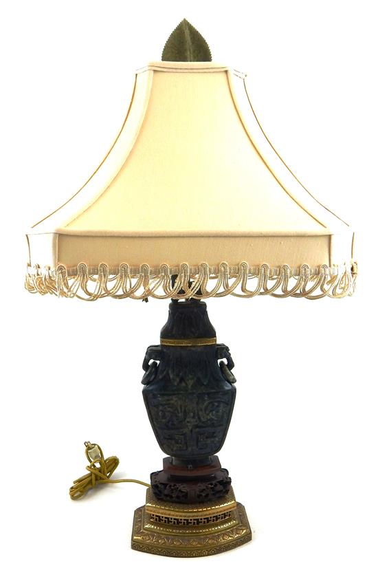 Appraisal: ASIAN Table lamp with carved green hardstone base ring handled