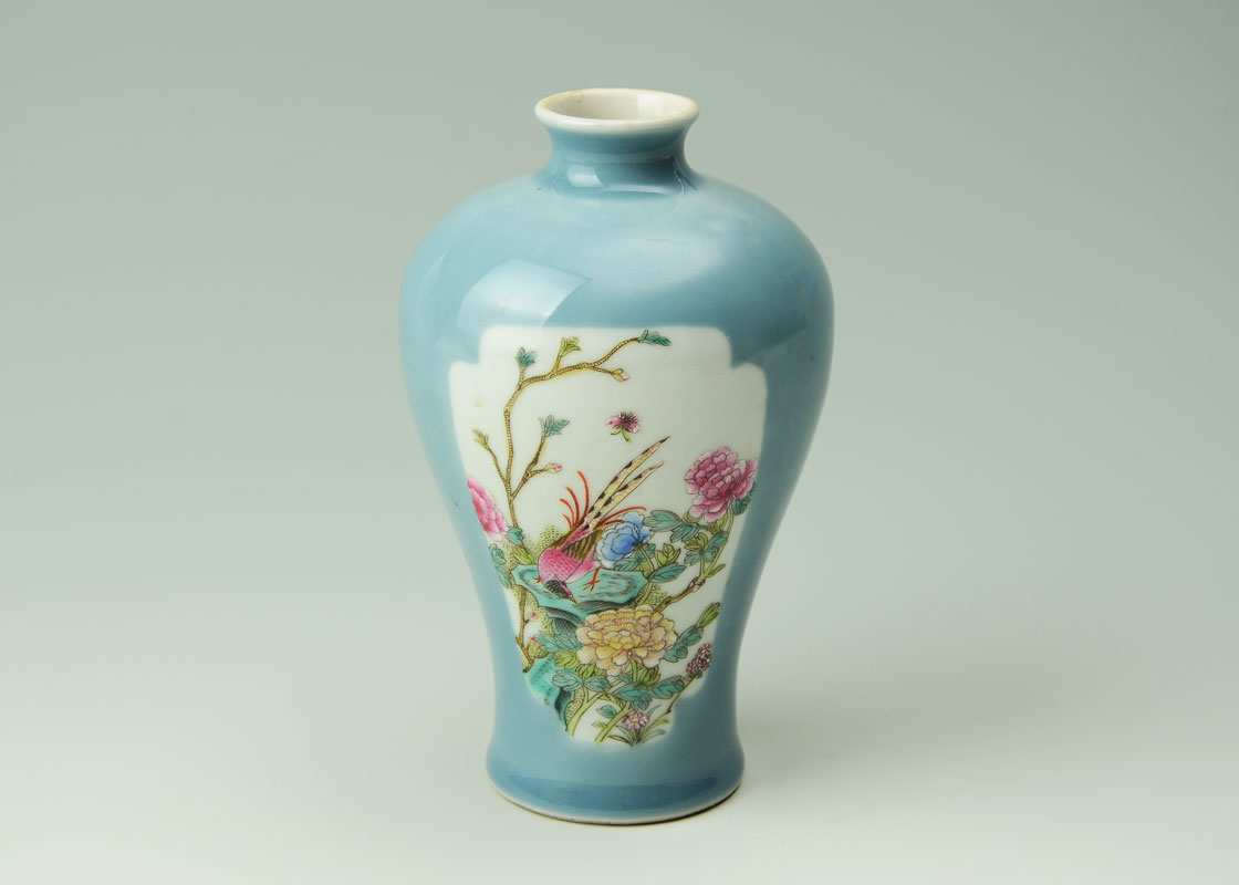 Appraisal: CHINESE PORCELAIN BLUE GROUND VASE Baluster form with small neck