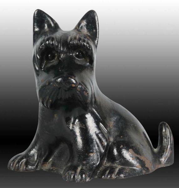 Appraisal: Sitting Scottie Dog Cast Iron Doorstop Description President Roosevelt dog