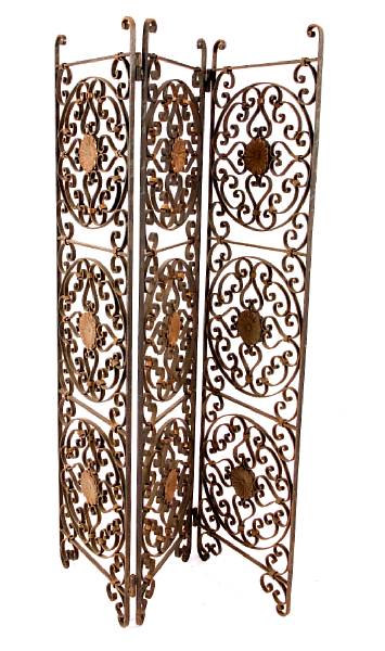 Appraisal: A pair of six panel wrought iron and tole screens