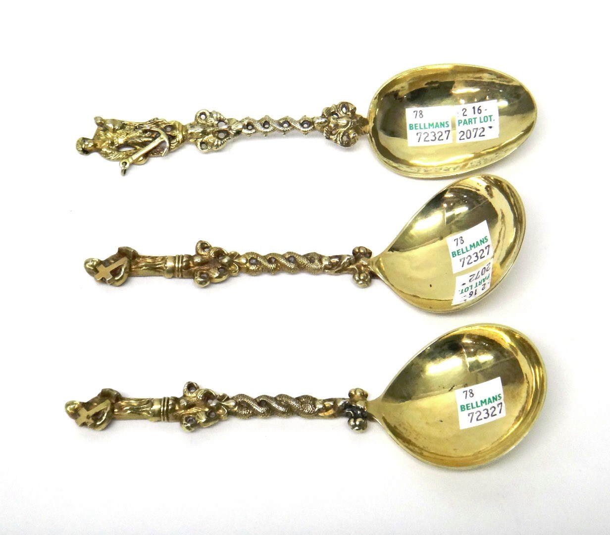 Appraisal: A pair of European silver gilt spoons the terminals cast