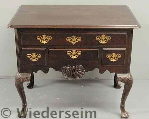 Appraisal: Fine Philadelphia Chippendale style walnut lowboy with a molded edge