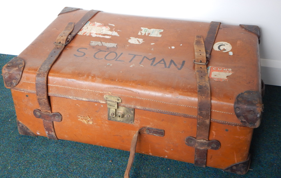 Appraisal: An early thC leather and canvas trunk with Bramah lock