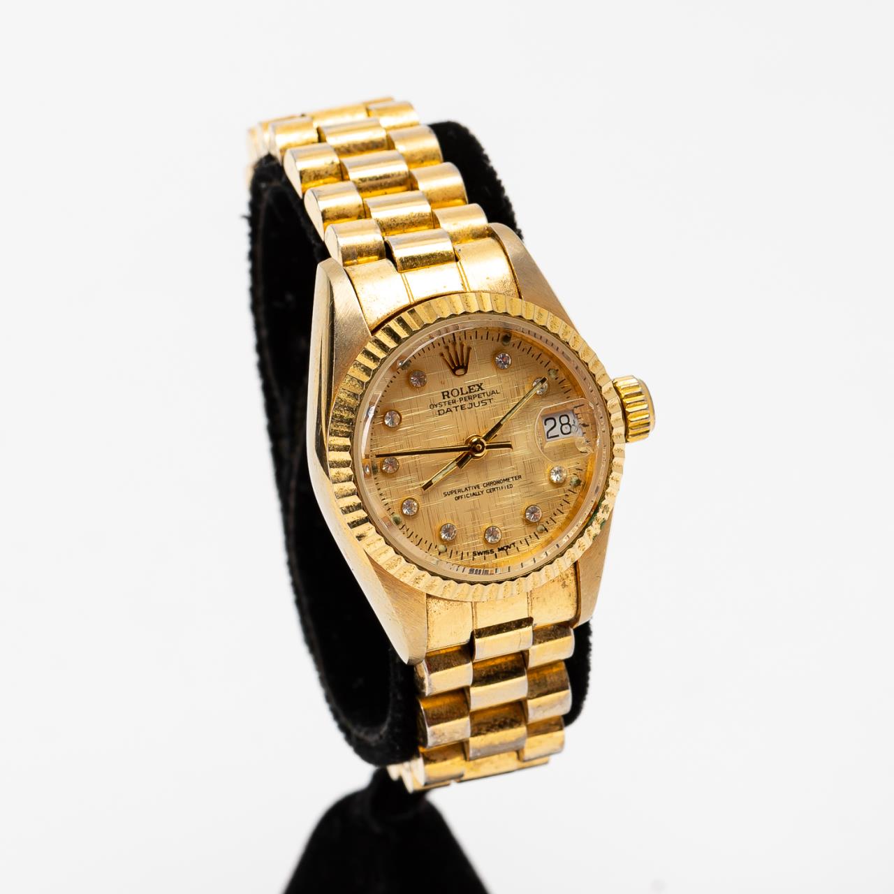 Appraisal: LADIES' ROLEX GOLD DATEJUST WITH DIAMONDS Ladies' gold Rolex Oyster